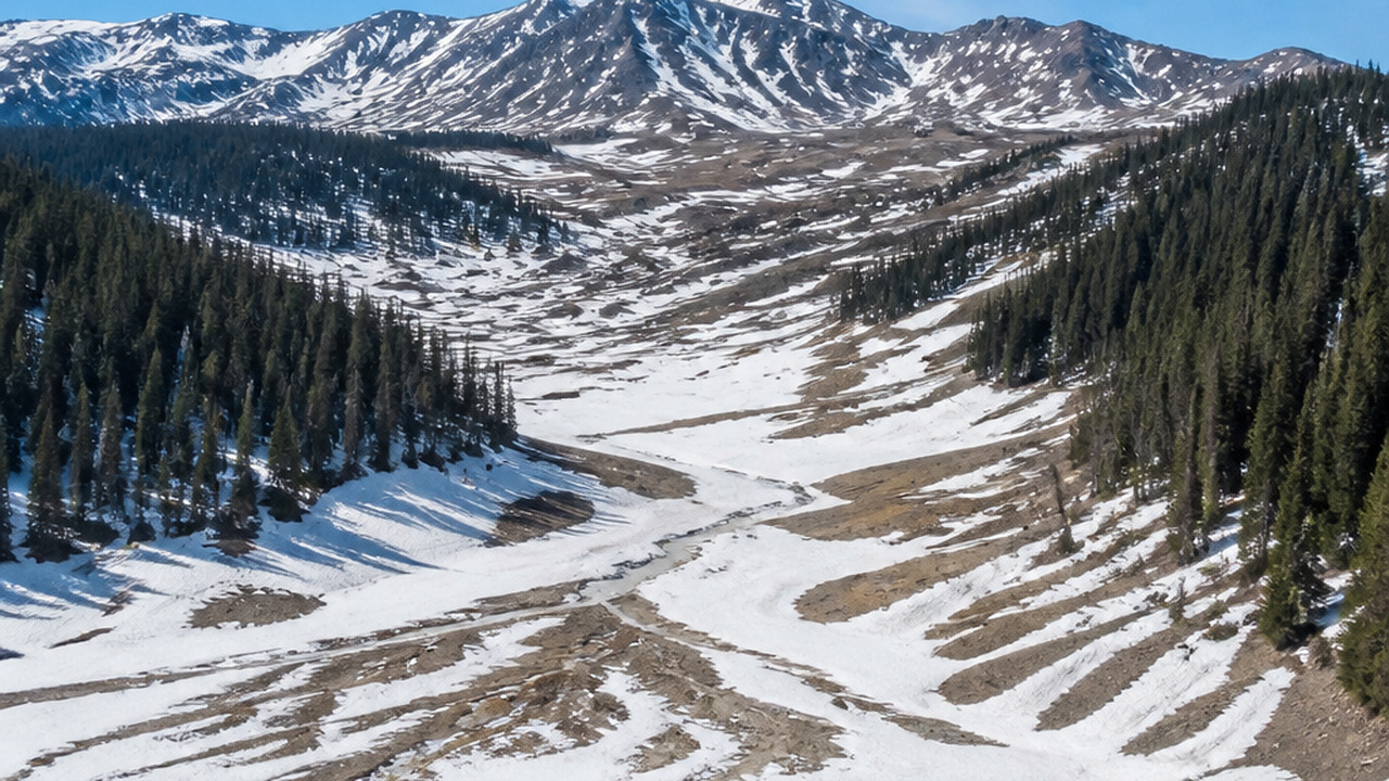 Aerial view of a snowy landscape demonstrating ...