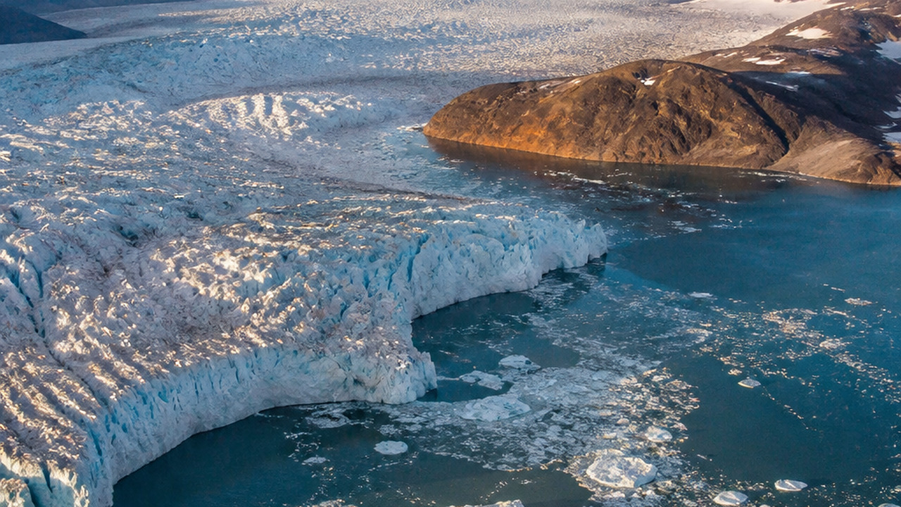 Aerial view of melting glaciers in the Arctic, ...