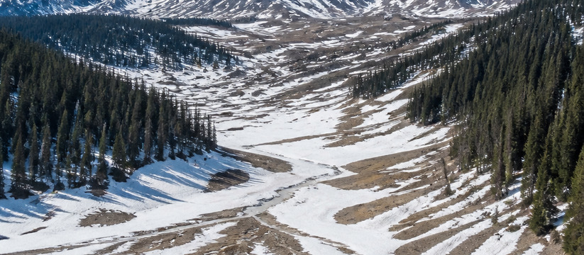 Aerial view of a snowy landscape demonstrating ...